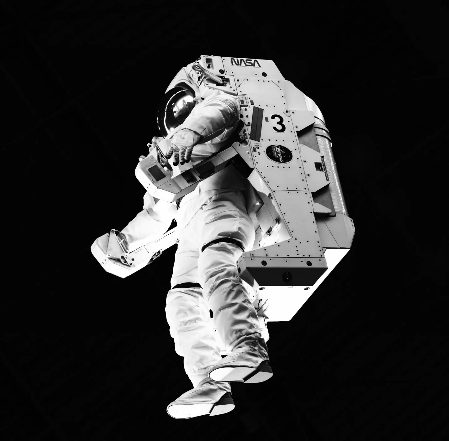 An astronaut with a spacesuit and space walking equipment.